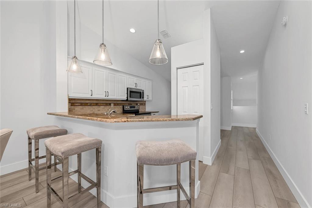 7436 Plumbago Bridge Road, Unit 203 Naples, FL 34109 - Photo 15 of 35 Breakfast Bar