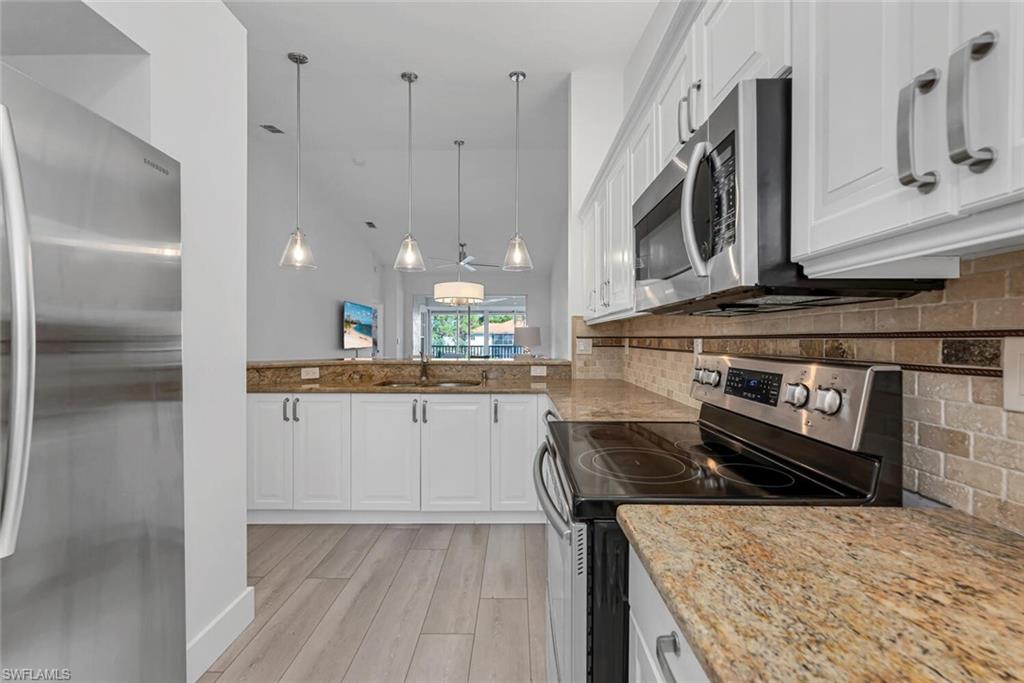 7436 Plumbago Bridge Road, Unit 203 Naples, FL 34109 - Photo 16 of 35 Kitchen