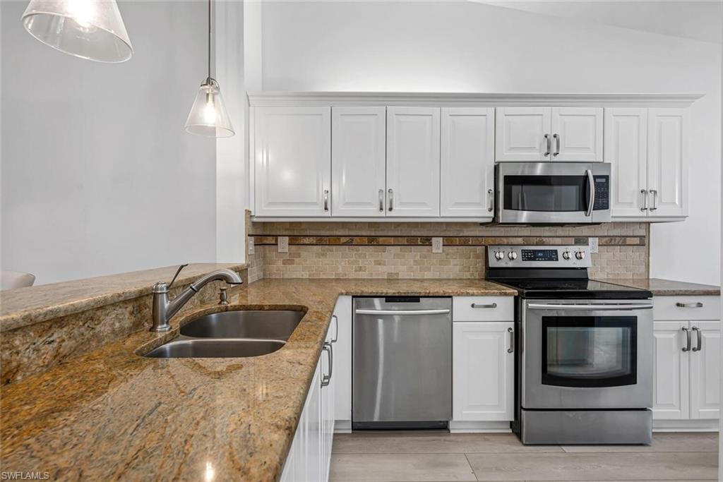 7436 Plumbago Bridge Road, Unit 203 Naples, FL 34109 - Photo 17 of 35 Kitchen