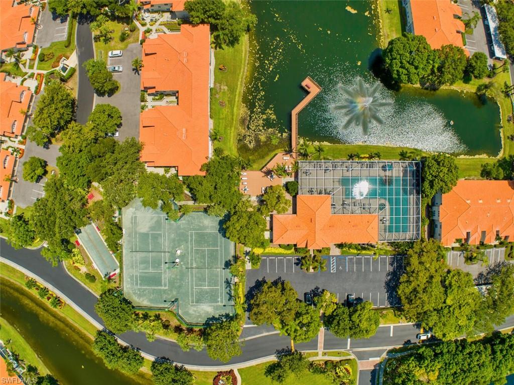 7436 Plumbago Bridge Road, Unit 203 Naples, FL 34109 - Photo 33 of 35 Clubhouse Aerial 2