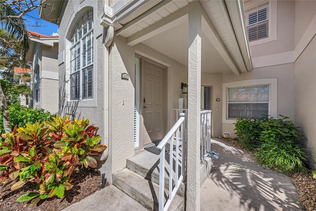 7436 Plumbago Bridge Road, Unit 203 Naples, FL 34109 - Photo 4 of 35 Front Entrance