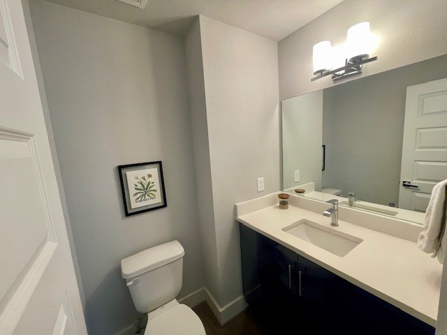 808 Fisher Street, Unit A Houston, TX 77018 - Photo 11 of 33 a bathroom with a sink and a toilet