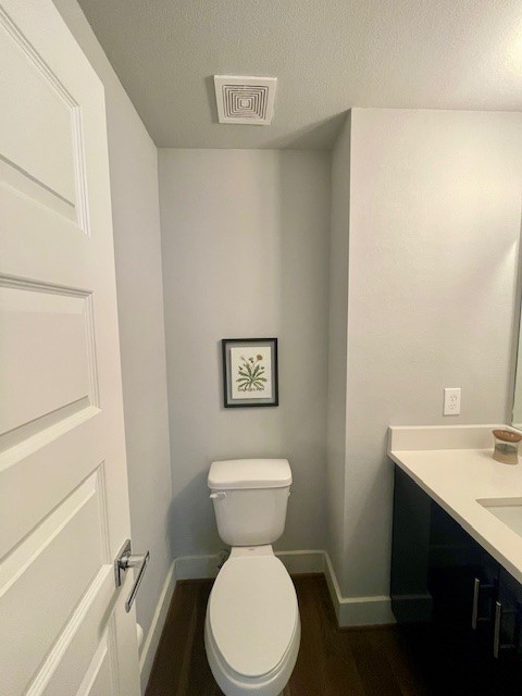 808 Fisher Street, Unit A Houston, TX 77018 - Photo 12 of 33 a bathroom with a toilet sink and mirror