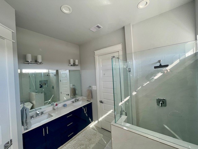 808 Fisher Street, Unit A Houston, TX 77018 - Photo 22 of 33 a bathroom with a double vanity sink mirror and double
