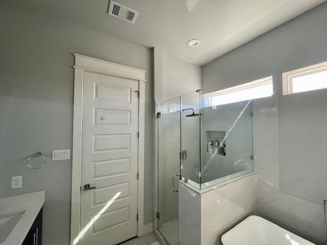 808 Fisher Street, Unit A Houston, TX 77018 - Photo 24 of 33 a bathroom with a toilet and a shower
