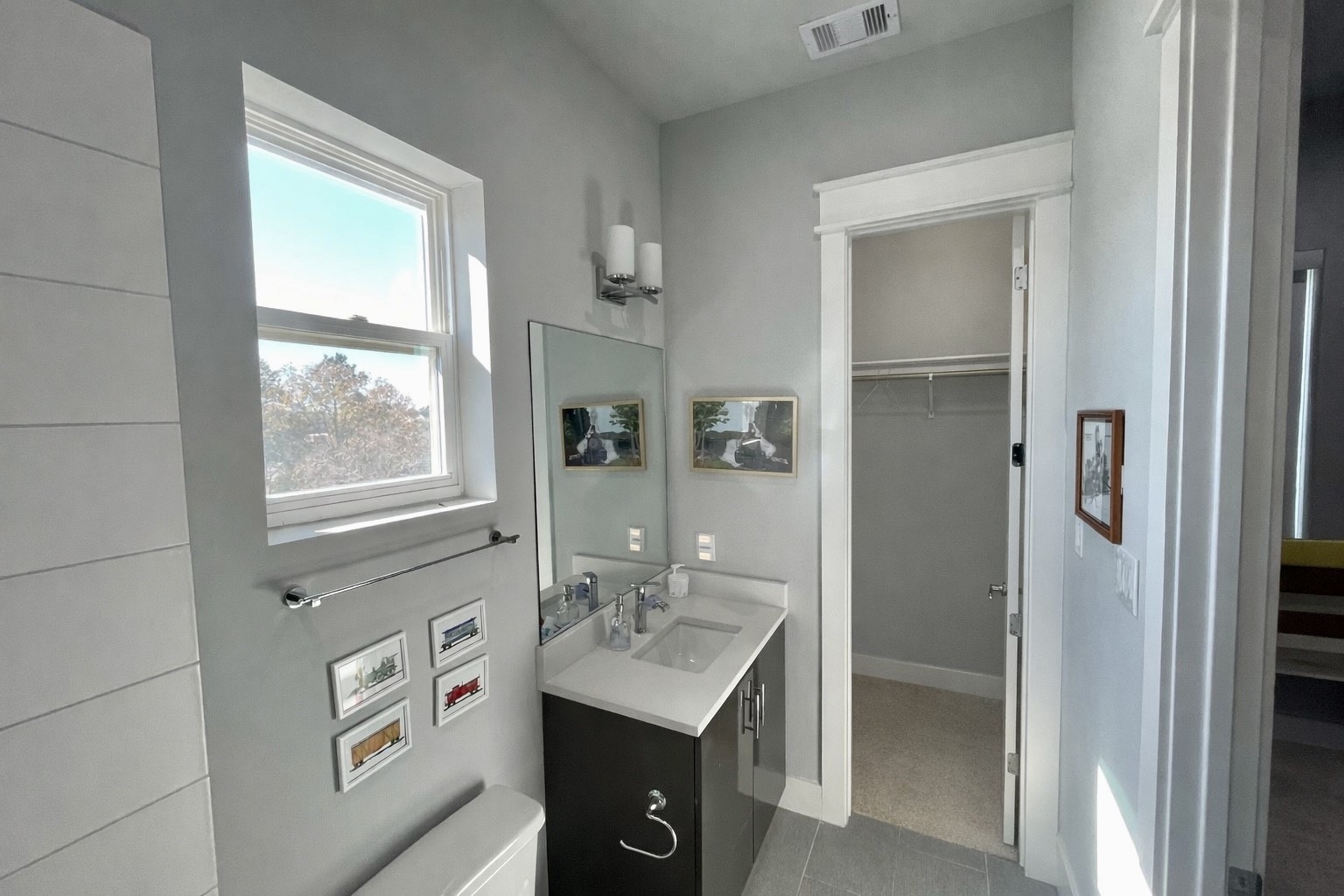 808 Fisher Street, Unit A Houston, TX 77018 - Photo 30 of 33 a bathroom with a sink a vanity and a mirror