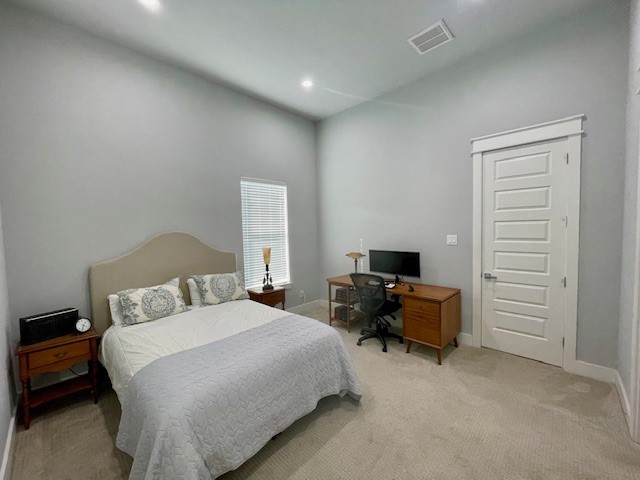 808 Fisher Street, Unit A Houston, TX 77018 - Photo 6 of 33 a bedroom with a bed and furniture