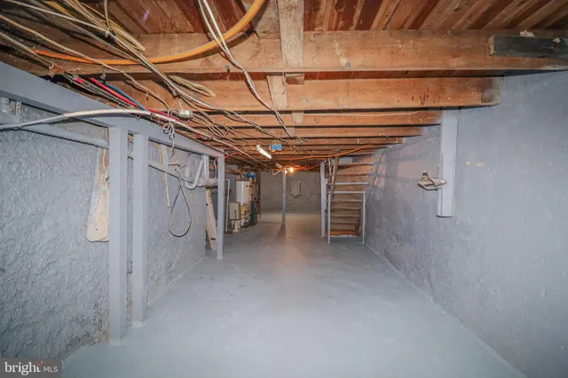 a view of a wooden floor and a window