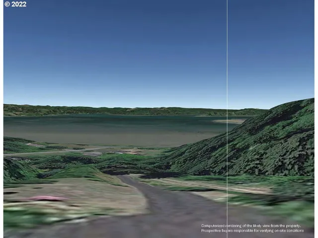 a view of a lake with a big yard