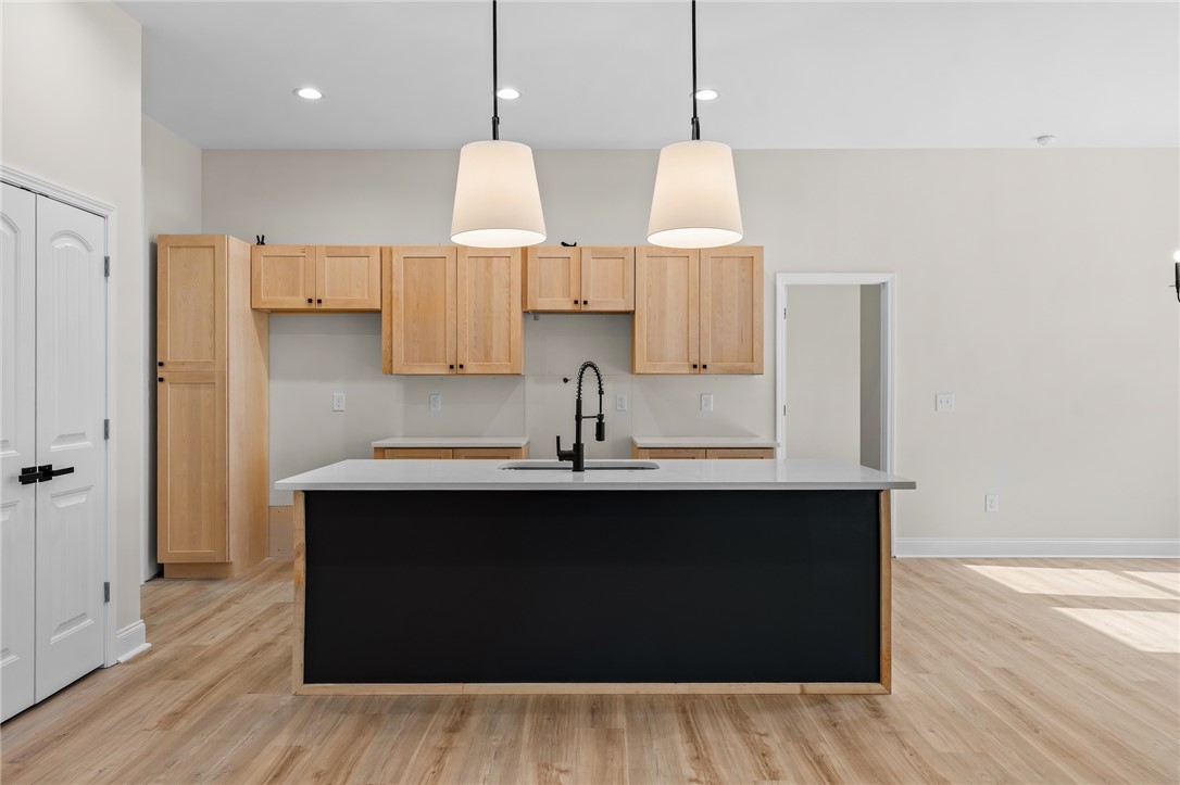 333 Lone Oak Road Anderson, SC 29621 - Photo 11 of 36 This bright kitchen features a large island and ample cabinetry, ready for culinary creations.