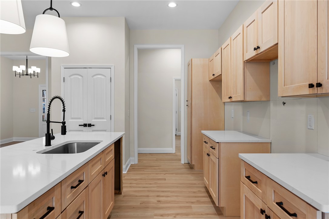 333 Lone Oak Road Anderson, SC 29621 - Photo 13 of 36 This bright kitchen features ample counter space and storage, perfect for culinary adventures.