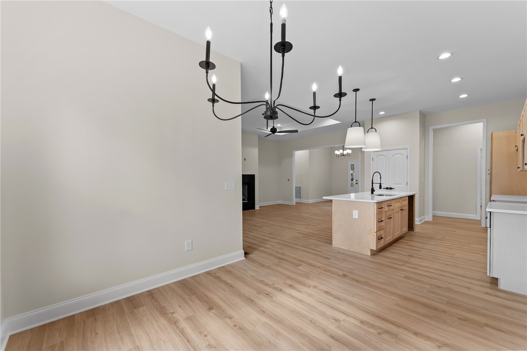 333 Lone Oak Road Anderson, SC 29621 - Photo 36 of 36 This bright interior features an open floorplan, showcasing a seamless flow between rooms.