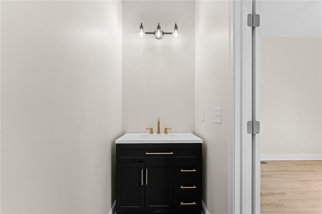 333 Lone Oak Road Anderson, SC 29621 - Photo 18 of 36 This modern vanity with a sleek design enhances the clean aesthetic of the space.