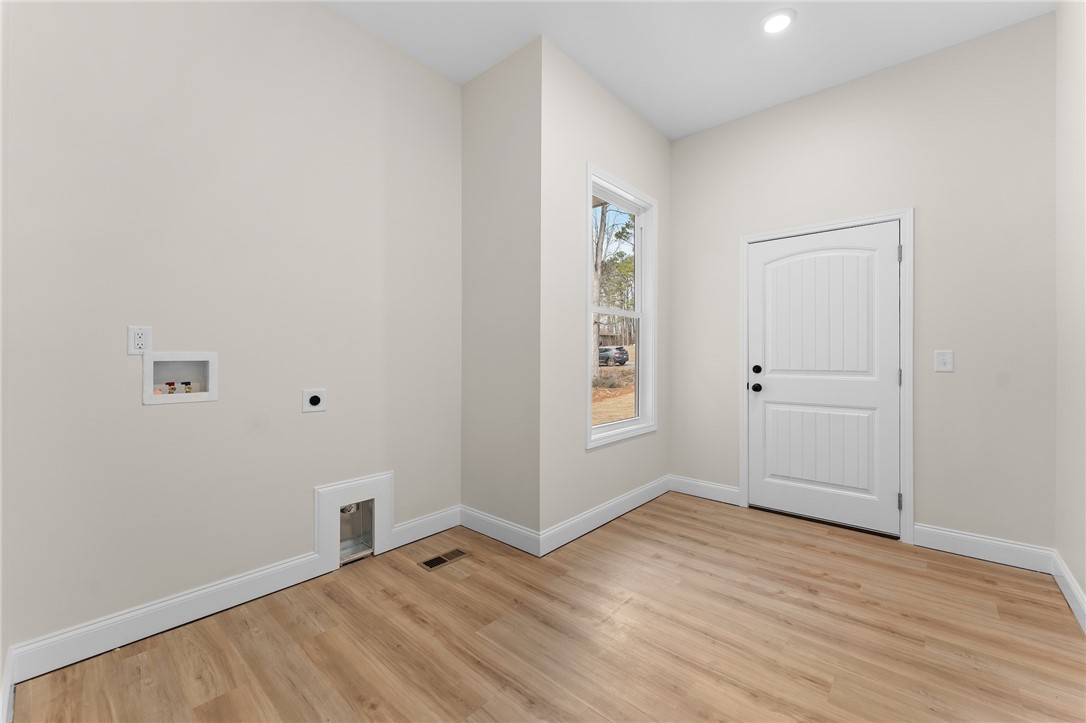 333 Lone Oak Road Anderson, SC 29621 - Photo 19 of 36 This spacious laundry room offers convenience and abundant natural light.