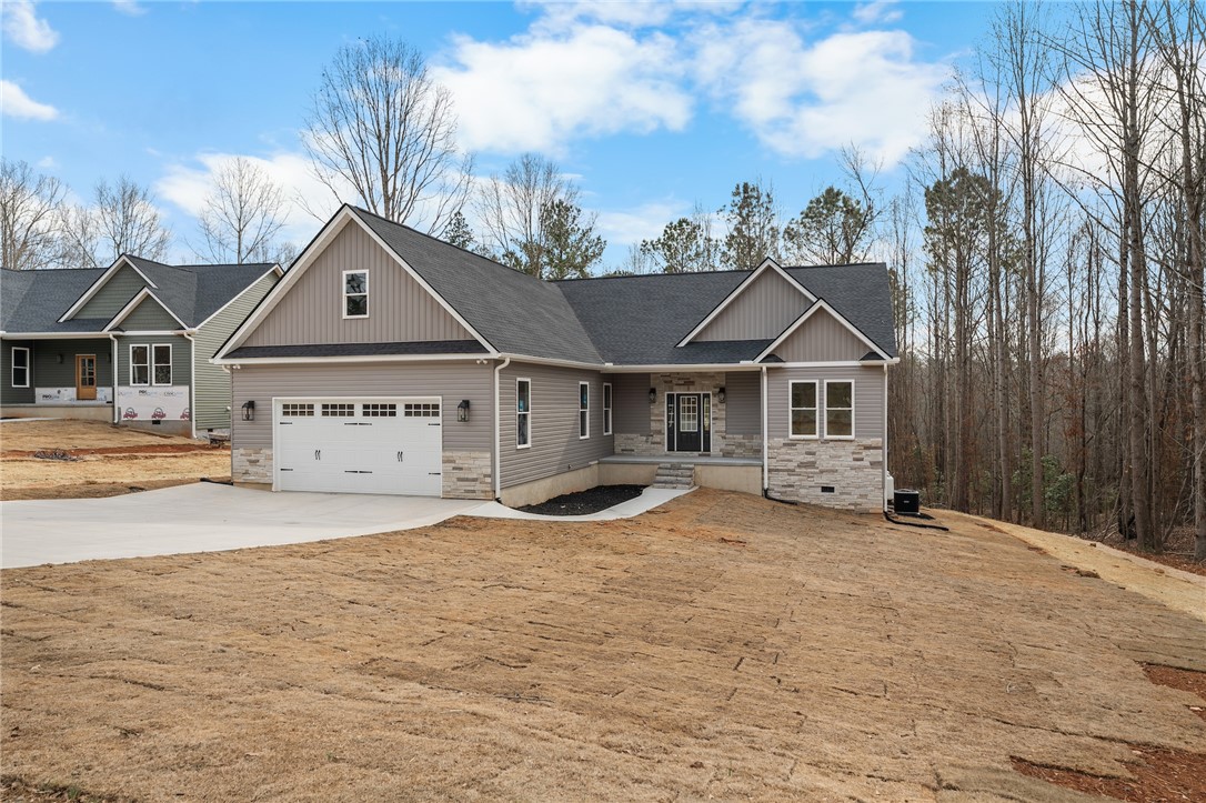 333 Lone Oak Road Anderson, SC 29621 - Photo 2 of 36 This newly constructed home features a welcoming facade and a spacious driveway.