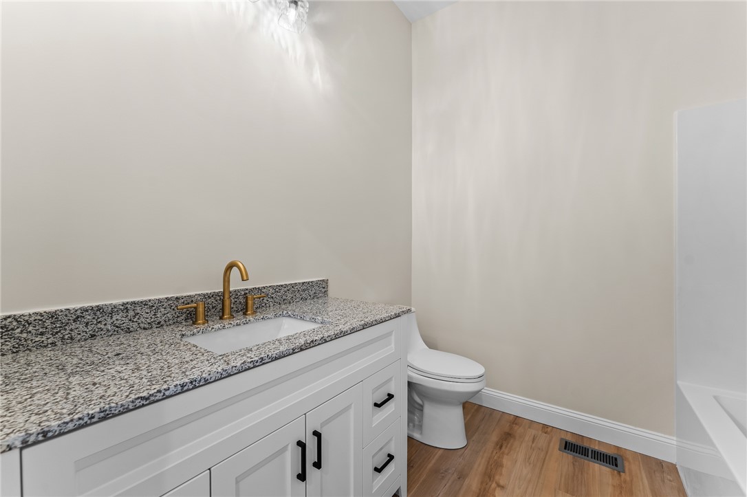 333 Lone Oak Road Anderson, SC 29621 - Photo 29 of 36 This clean bathroom showcases a sleek vanity with ample counter space and modern fixtures.