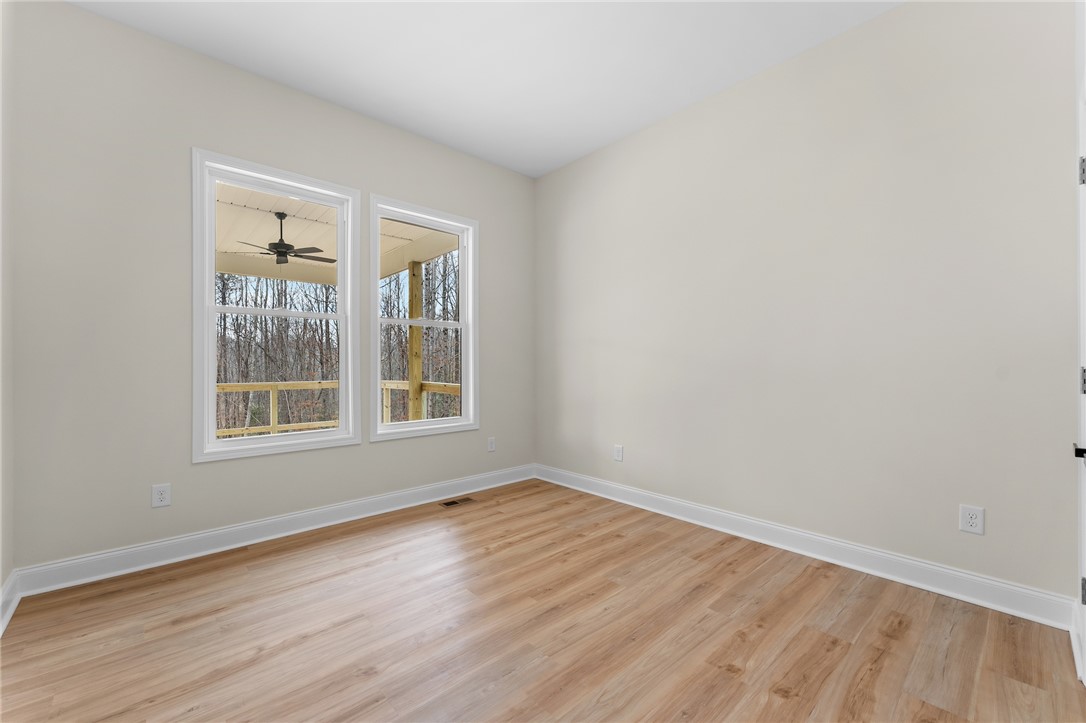 333 Lone Oak Road Anderson, SC 29621 - Photo 30 of 36 This bright room features durable laminate flooring and inviting views of the outdoors.