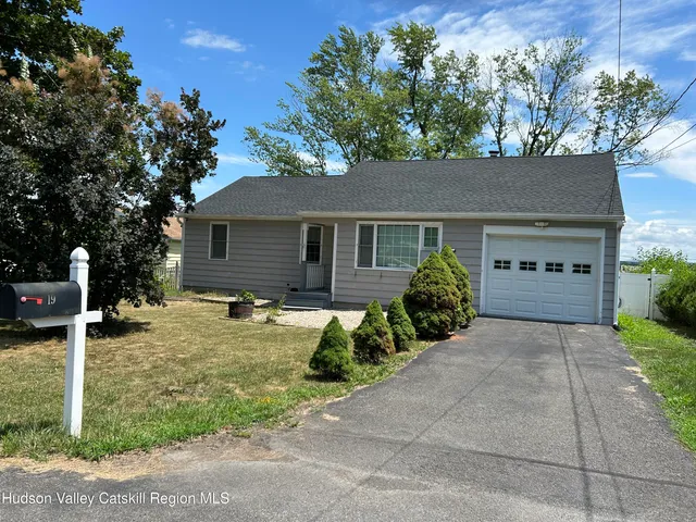 a picture of a bathroom with a shower