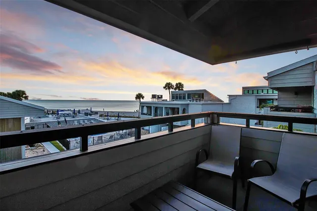 a view of a balcony with city view