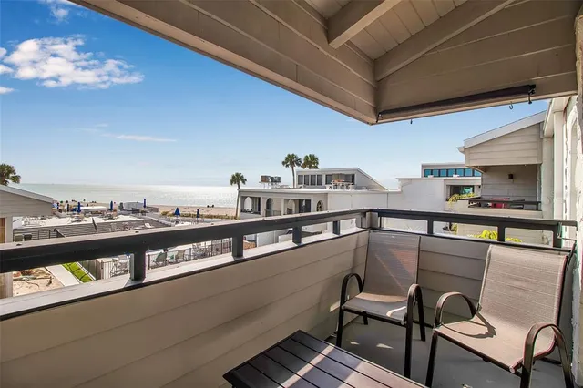 a kitchen with a table and chairs
