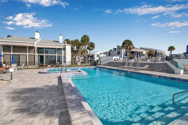 a view of a house with a swimming pool