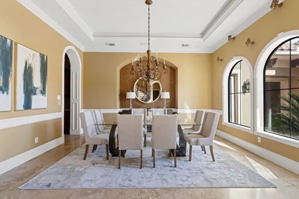 a kitchen with sink refrigerator and stove