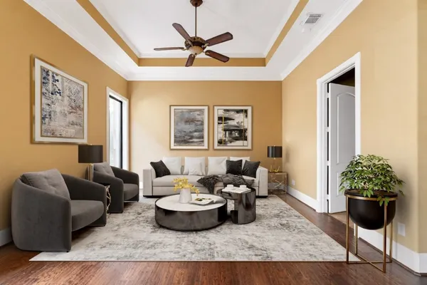 a bathroom with a granite countertop sink mirror vanity and a toilet