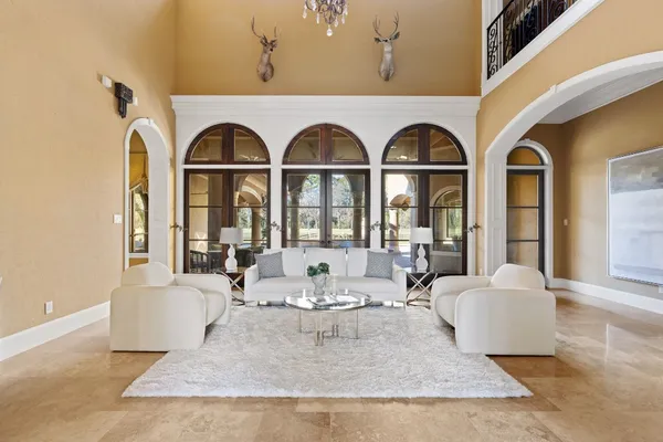 a kitchen with center island table and chairs in it