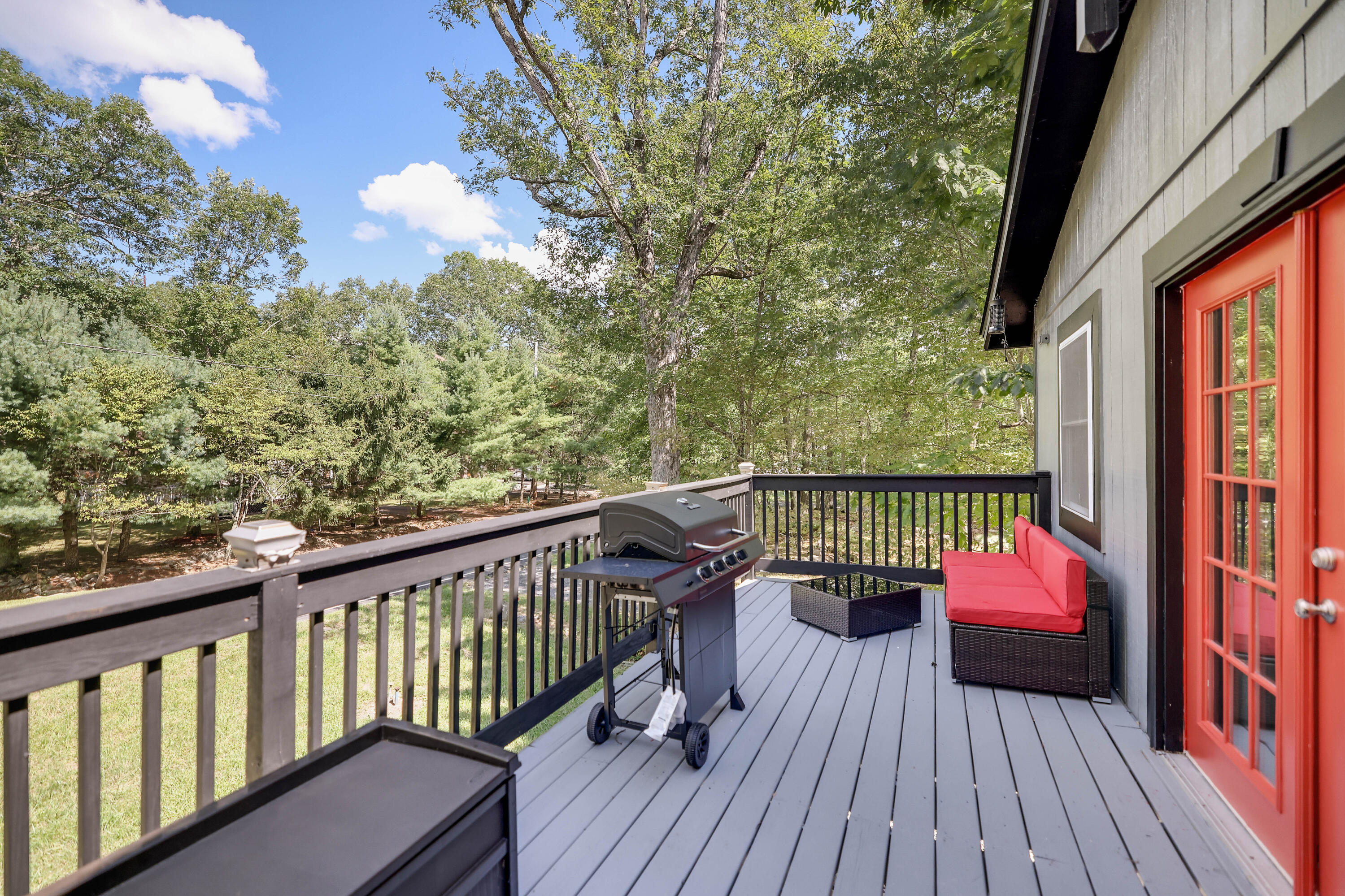 6114 Decker Road Bushkill, PA 18324 - Photo 42 of 65 a balcony with wooden floor and furniture