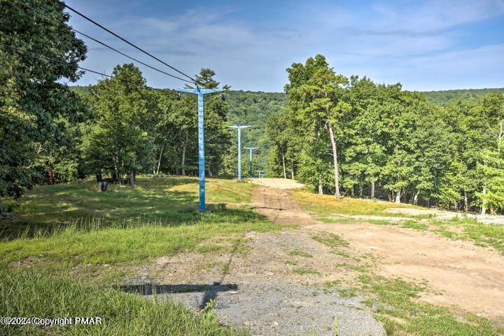 6114 Decker Road Bushkill, PA 18324 - Photo 61 of 65 a backyard of a house with lots of green space