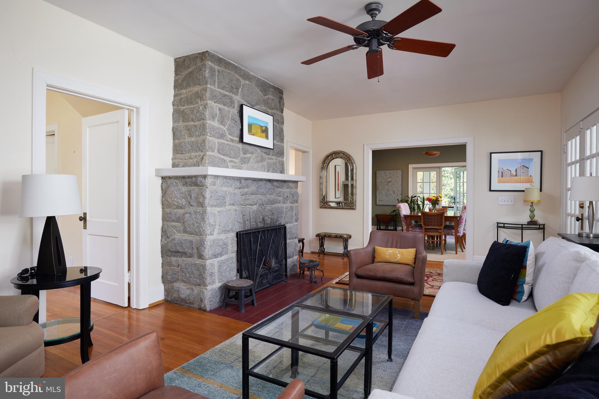 4236 River Road Northwest Washington, DC 20016 - Photo 11 of 44 a living room with furniture and a fireplace