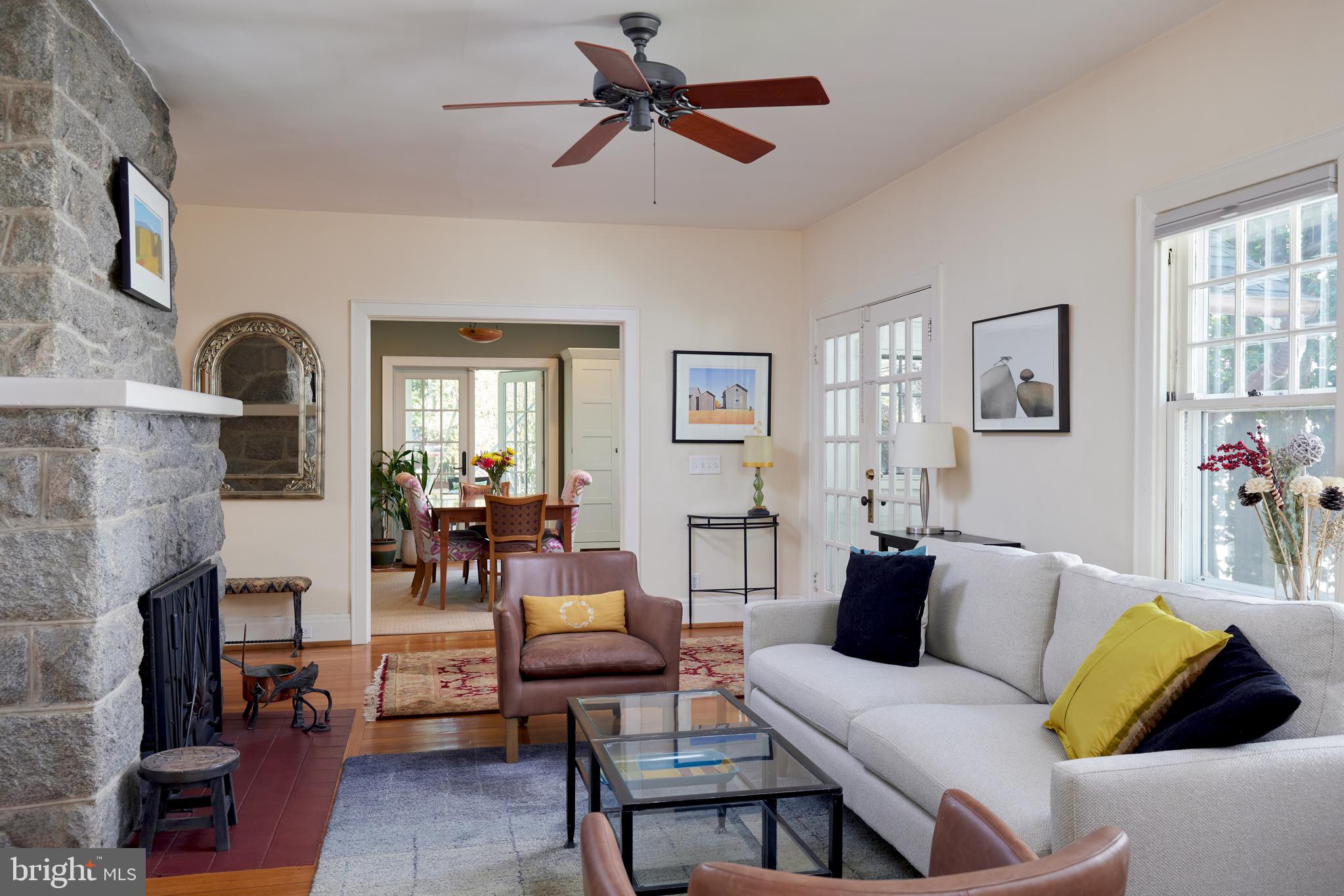 4236 River Road Northwest Washington, DC 20016 - Photo 12 of 44 a living room with furniture and a fireplace
