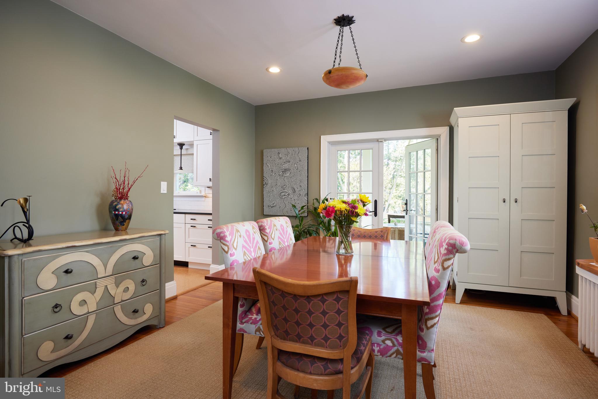 4236 River Road Northwest Washington, DC 20016 - Photo 15 of 44 a view of a dining room with furniture and window