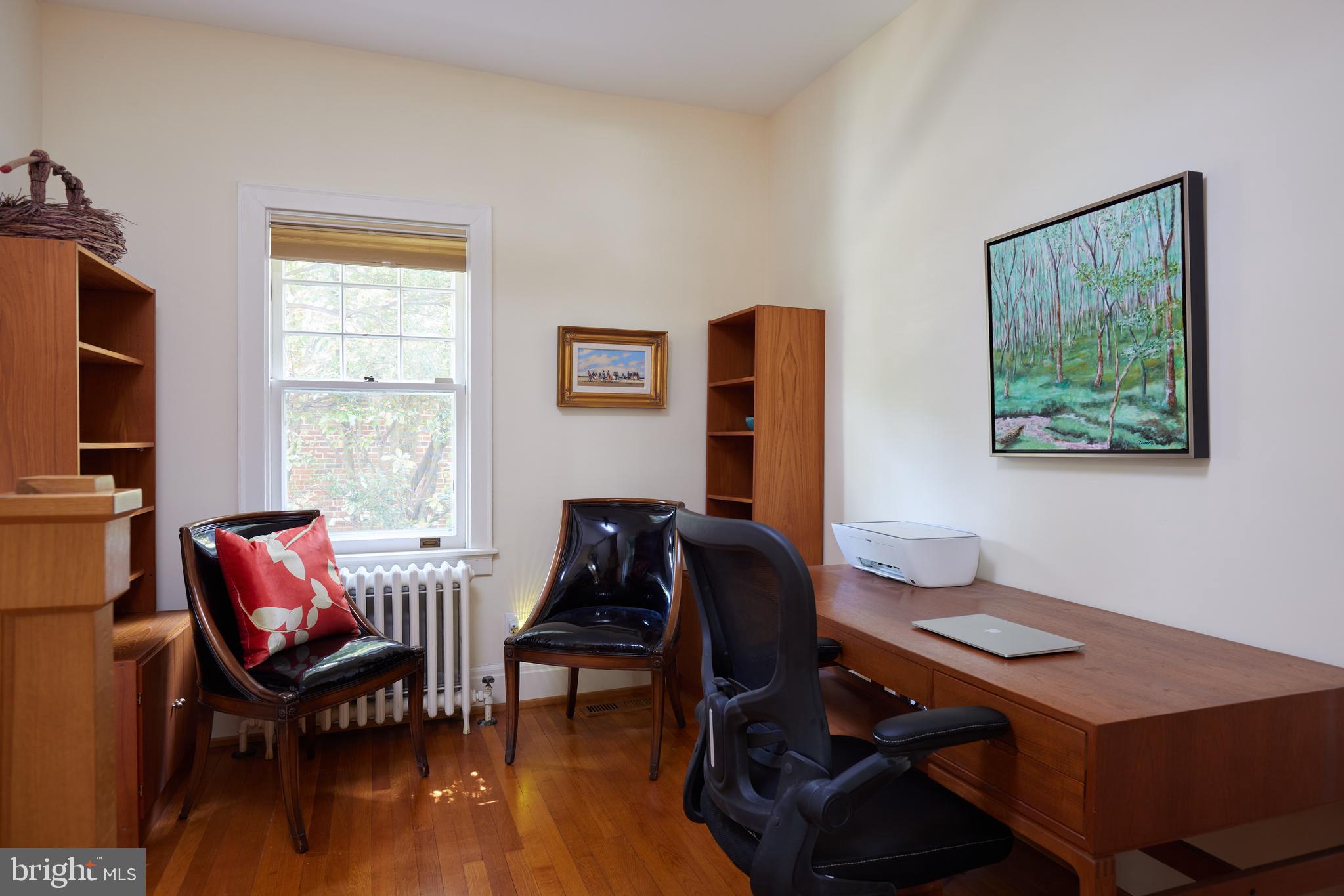 4236 River Road Northwest Washington, DC 20016 - Photo 28 of 44 a view of a workspace with furniture and a window