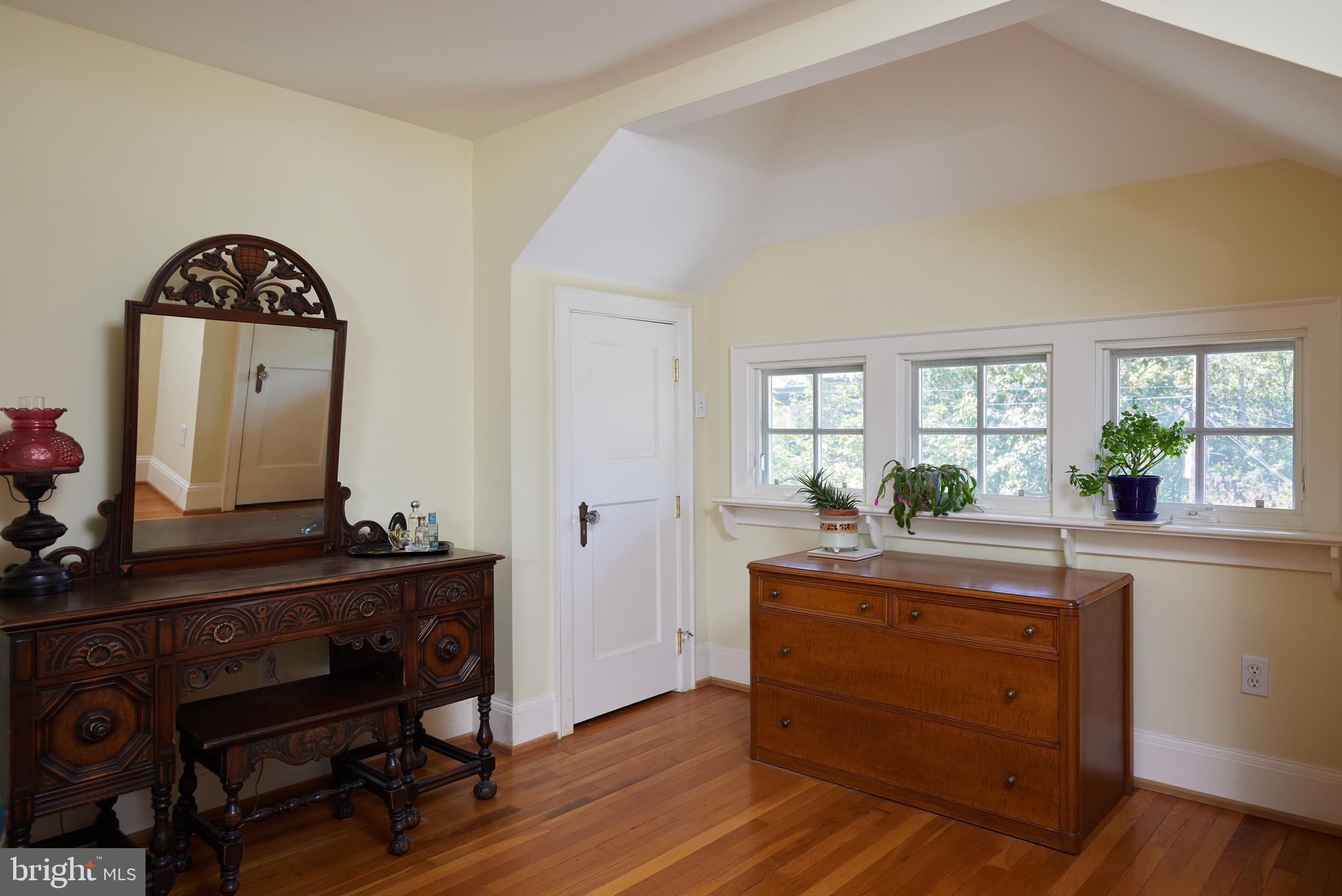 4236 River Road Northwest Washington, DC 20016 - Photo 33 of 44 a living room with furniture and a dresser