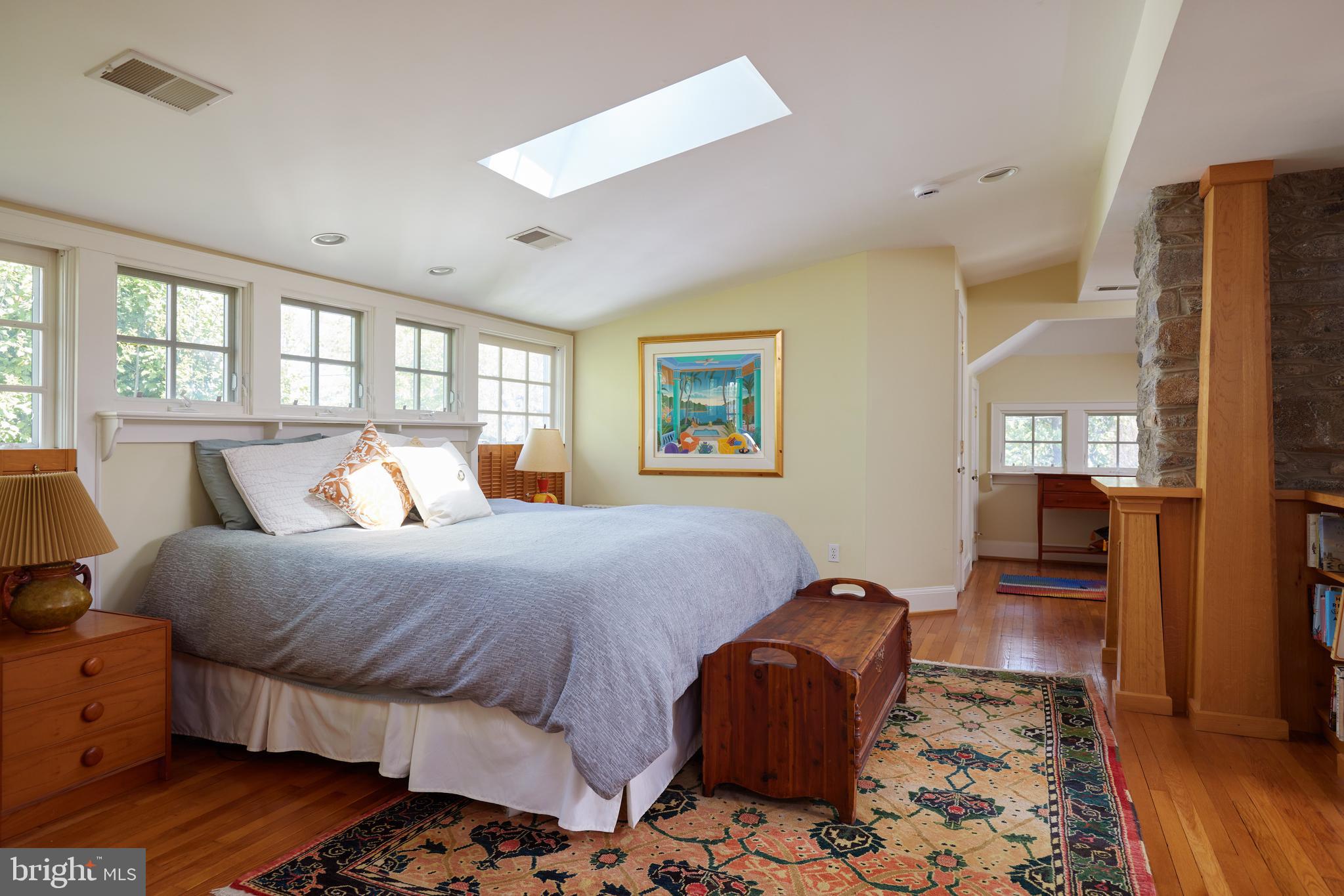 4236 River Road Northwest Washington, DC 20016 - Photo 34 of 44 a bed room with a bed and a couch