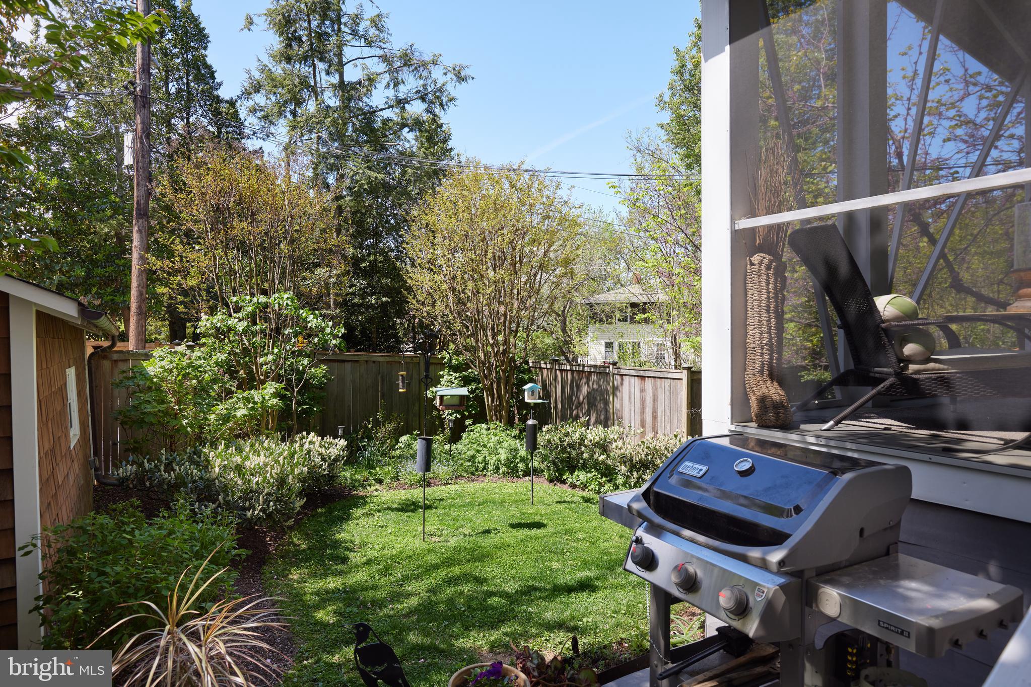 4236 River Road Northwest Washington, DC 20016 - Photo 40 of 44 a view of a yard with chairs