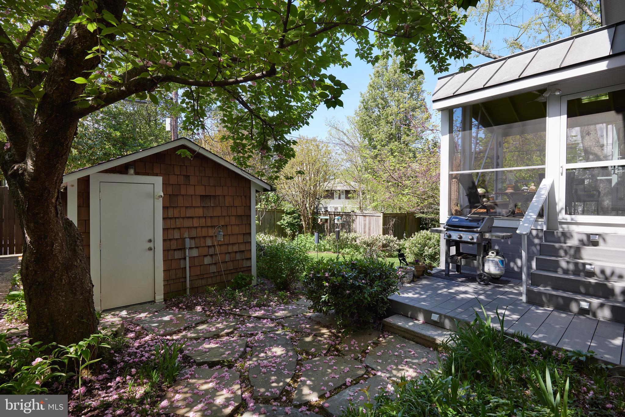 4236 River Road Northwest Washington, DC 20016 - Photo 41 of 44 a front view of a house with garden