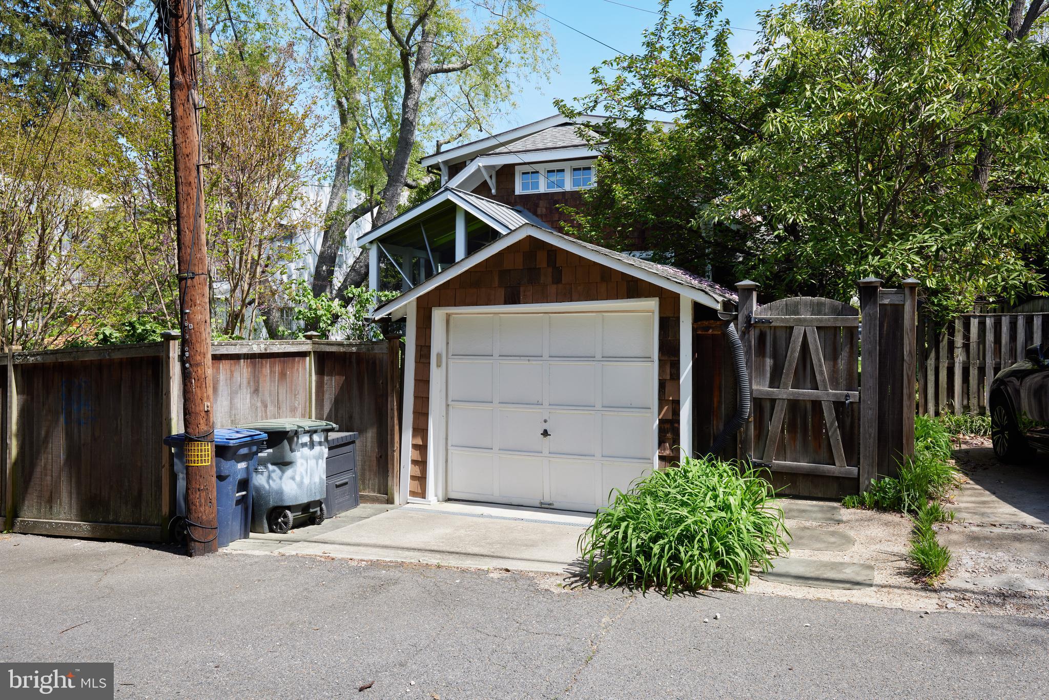 4236 River Road Northwest Washington, DC 20016 - Photo 44 of 44 a front view of a house with a yard and garage