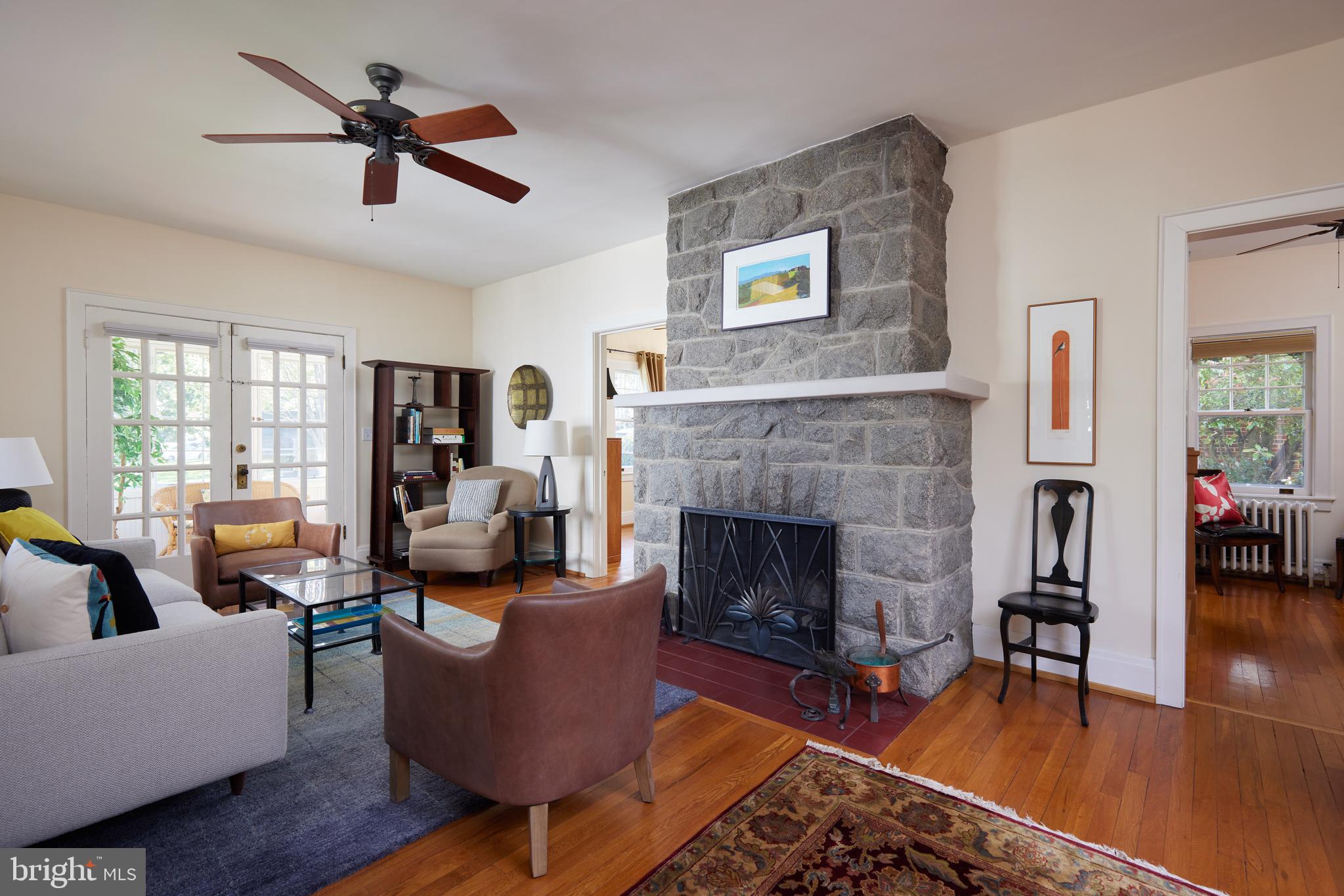 4236 River Road Northwest Washington, DC 20016 - Photo 5 of 44 a living room with furniture and a fireplace