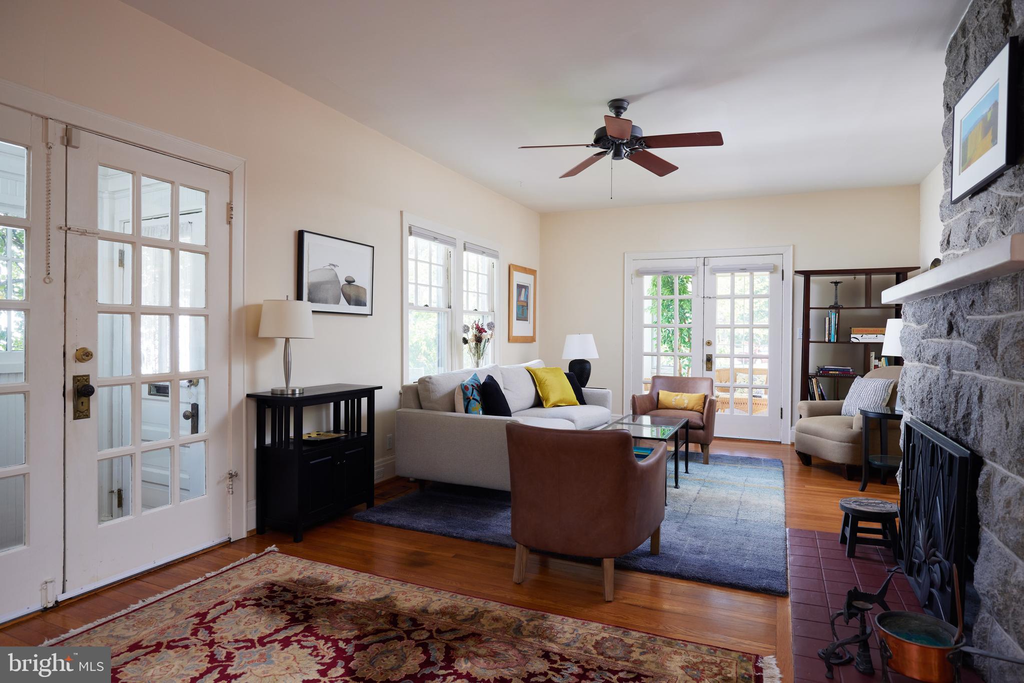 4236 River Road Northwest Washington, DC 20016 - Photo 7 of 44 a living room with furniture and a fireplace