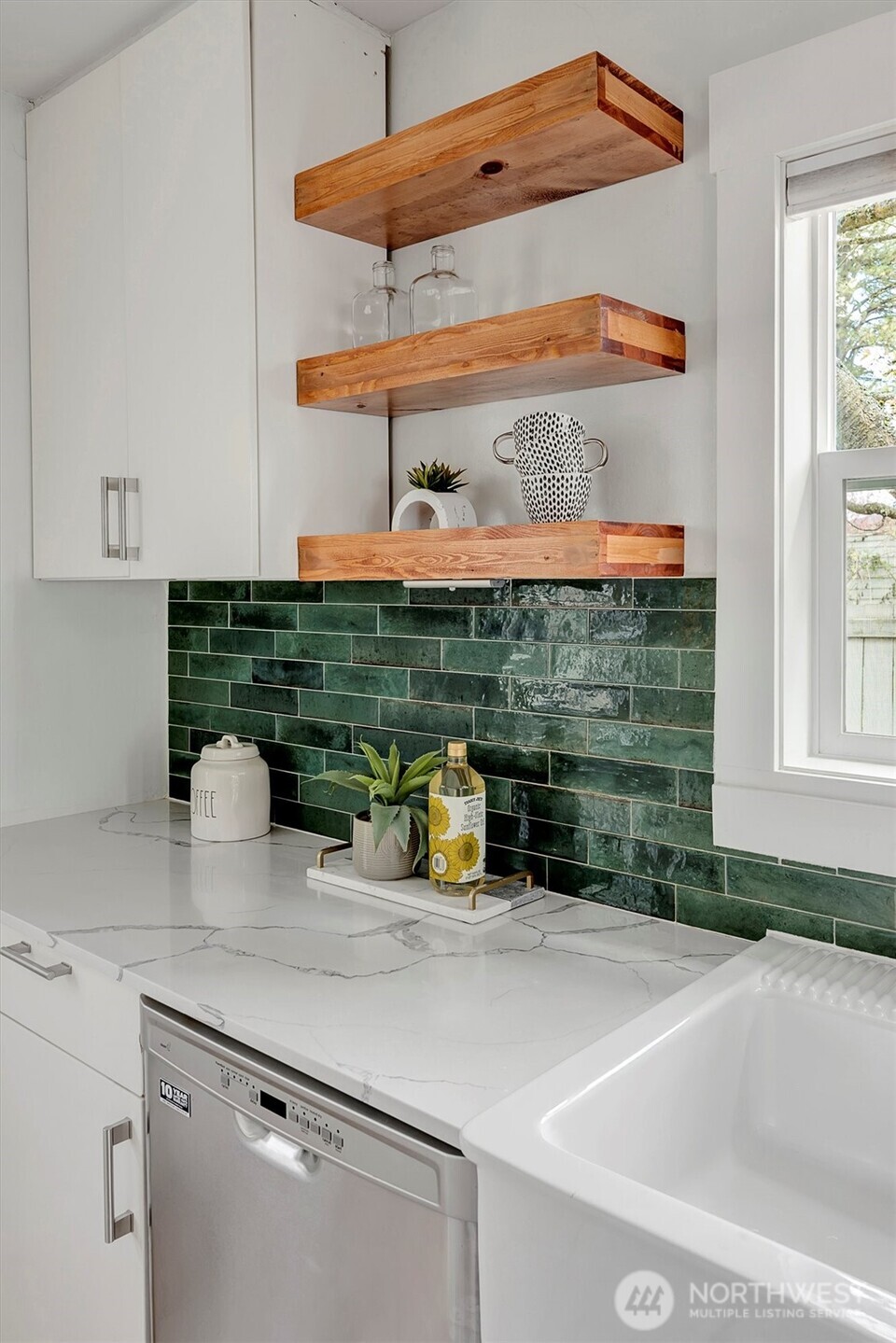 1112 North 80th Street Seattle, WA 98103 - Photo 12 of 29 a kitchen with a sink and a window