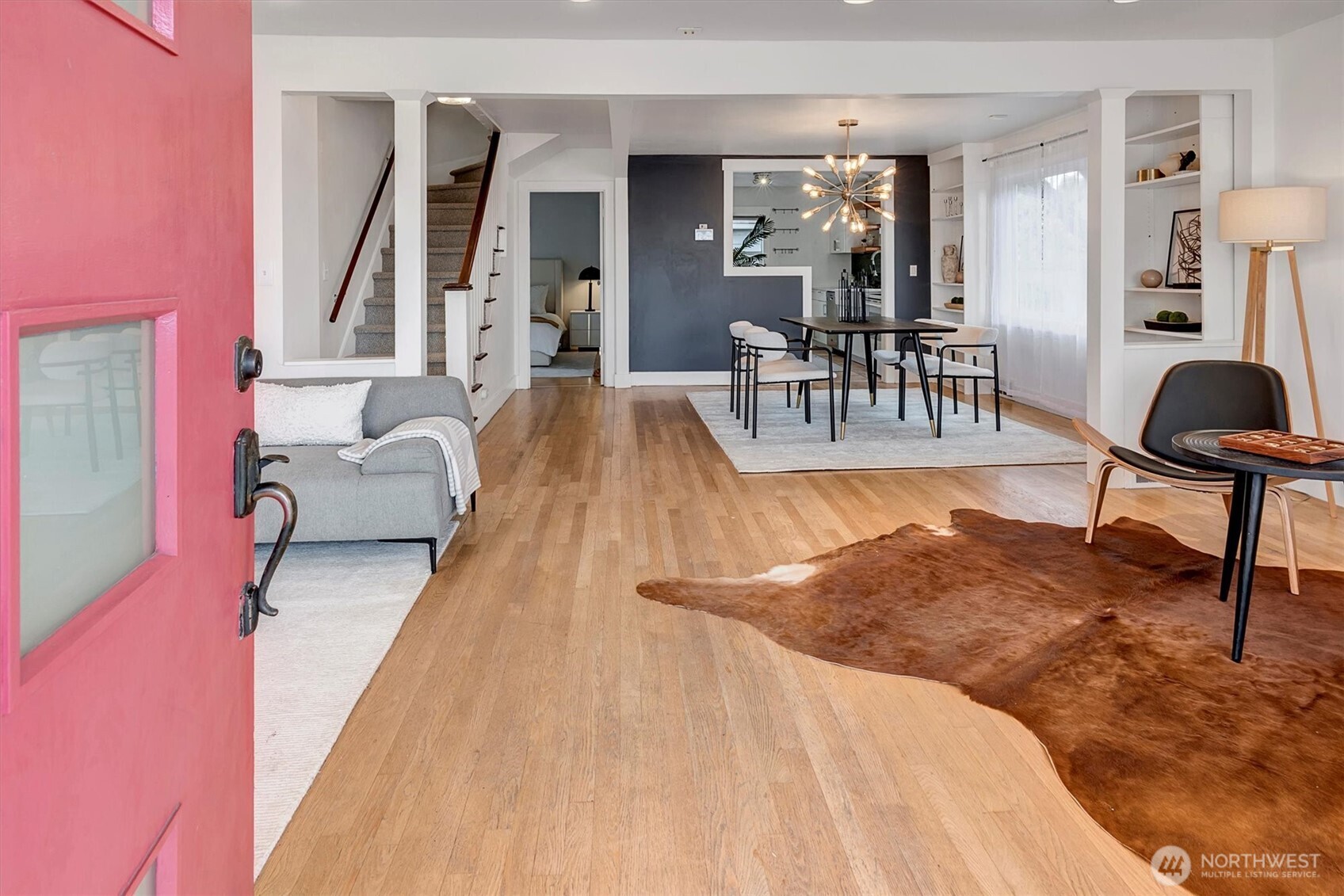 1112 North 80th Street Seattle, WA 98103 - Photo 2 of 29 a living room with furniture and wooden floor