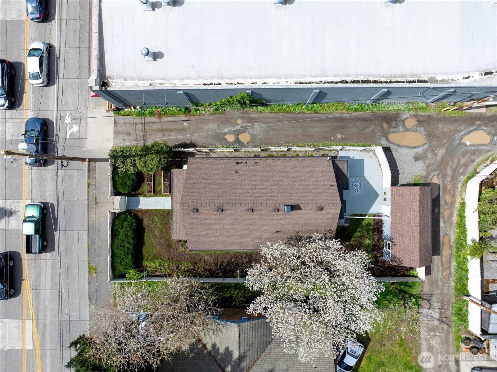 1112 North 80th Street Seattle, WA 98103 - Photo 25 of 29 an aerial view of a house with a lake view