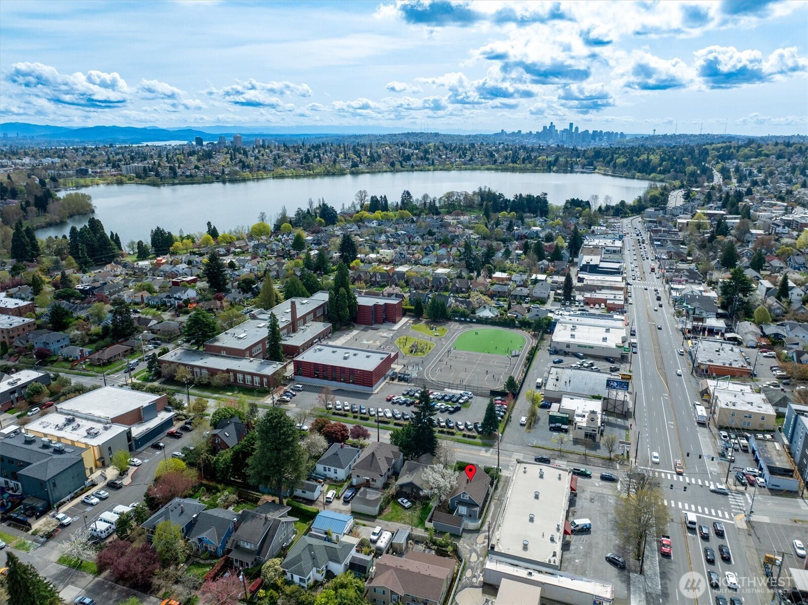 1112 North 80th Street Seattle, WA 98103 - Photo 26 of 29 an aerial view of a house with a lake view