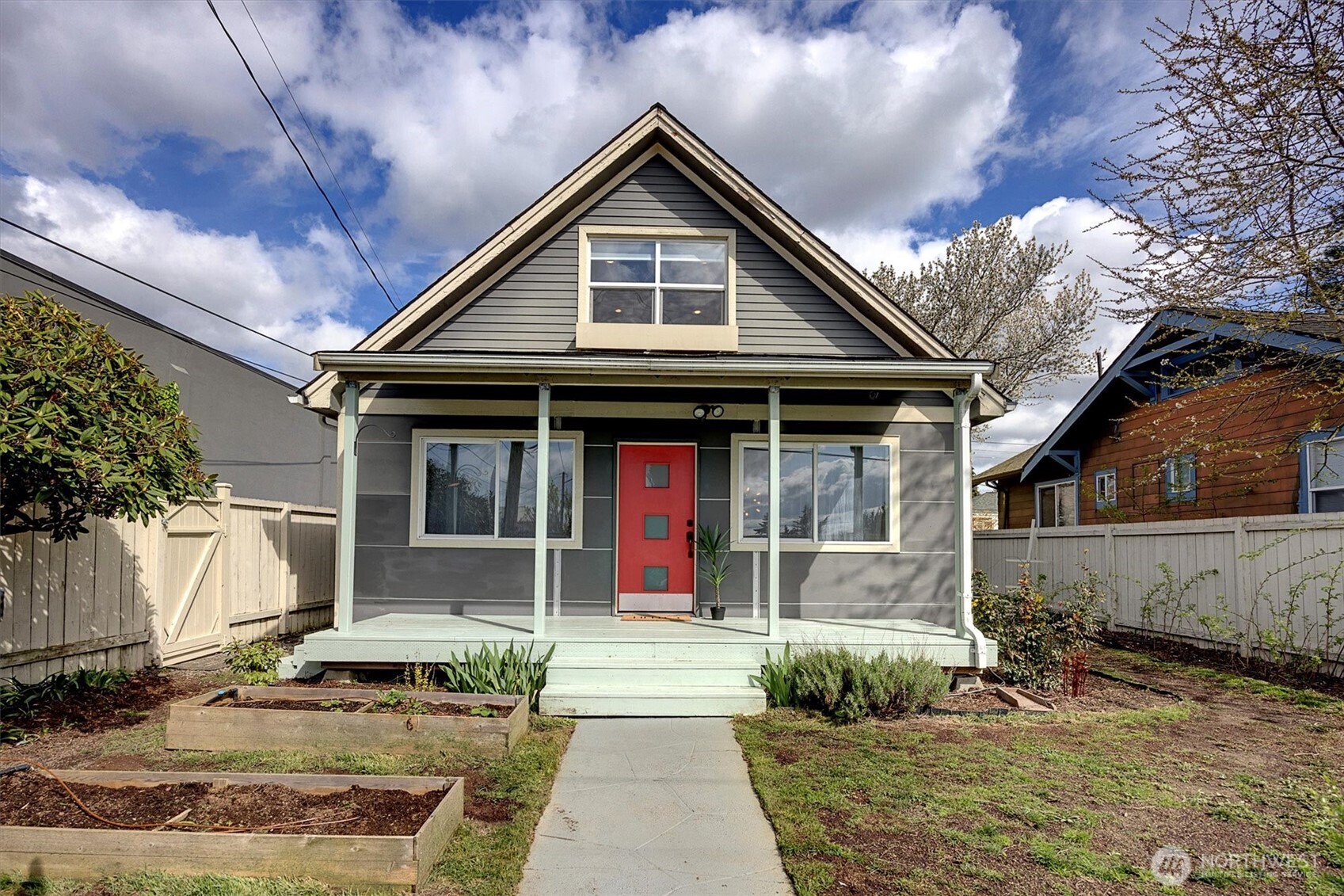1112 North 80th Street Seattle, WA 98103 - Photo 29 of 29 a front view of a house with garden