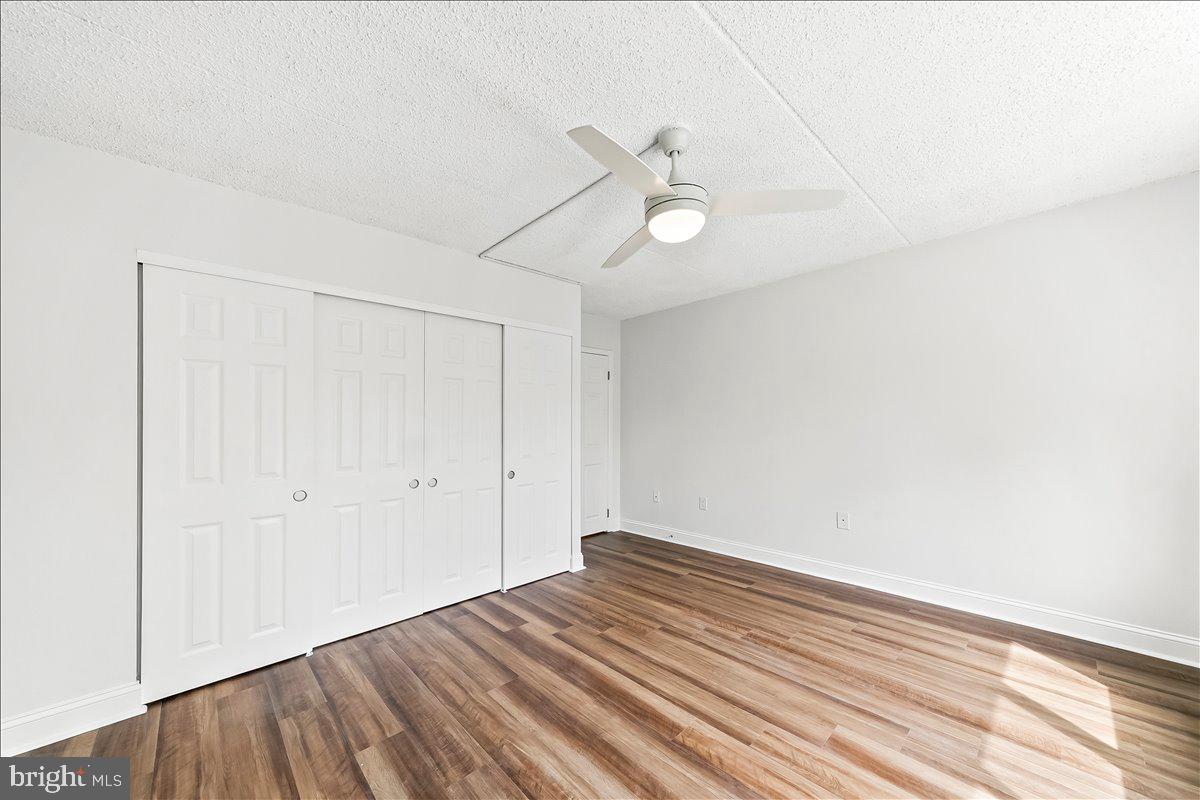 800 Avondale Road, Unit 5Q Wallingford, PA 19086 - Photo 14 of 25 wooden floor in an empty room