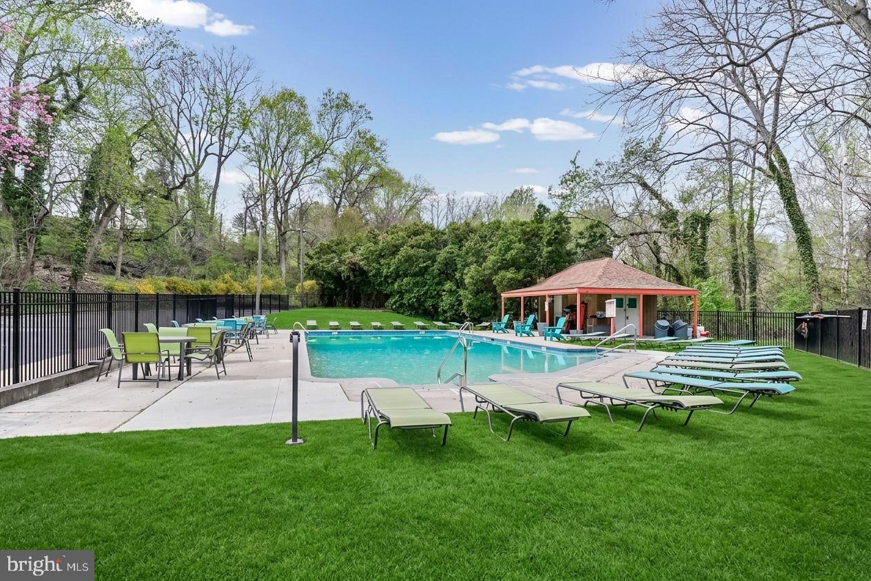 800 Avondale Road, Unit 5Q Wallingford, PA 19086 - Photo 24 of 25 a view of a chair and table in the garden