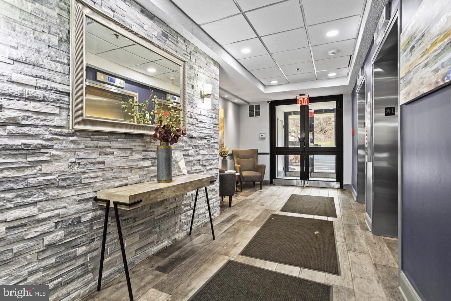 800 Avondale Road, Unit 5Q Wallingford, PA 19086 - Photo 3 of 25 a view of a porch with a table and chairs