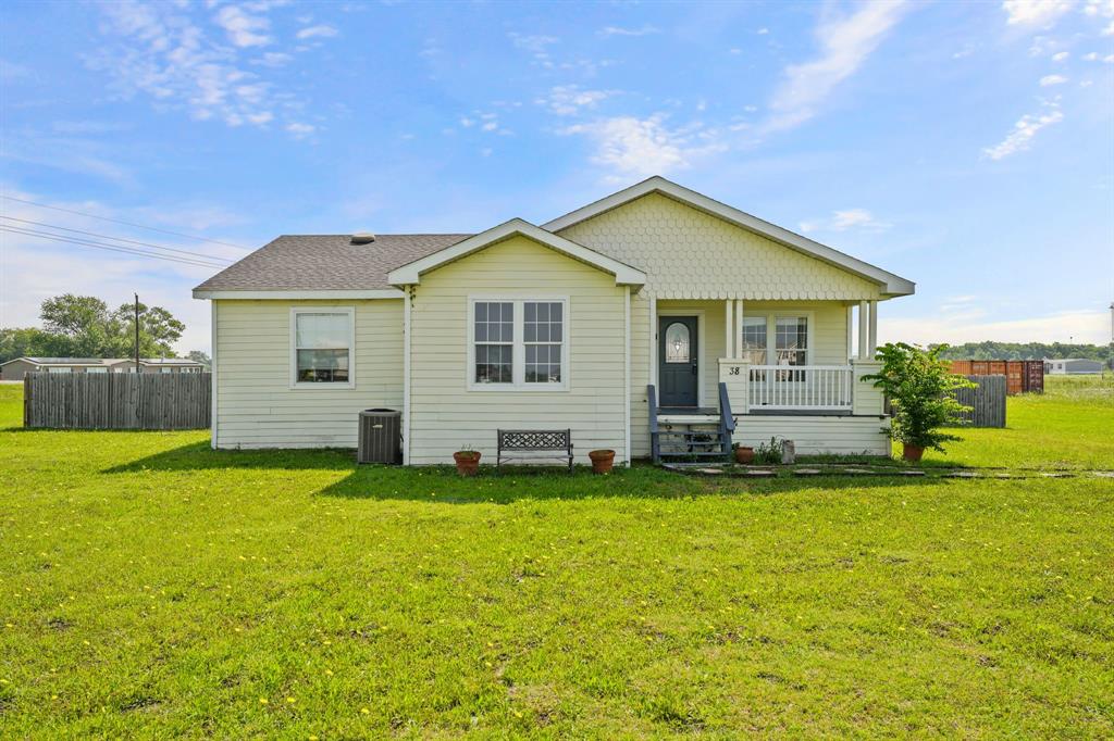 38 Darwin Road Whitewright, TX 75491 - Photo 1 of 1 a view of a house with a yard